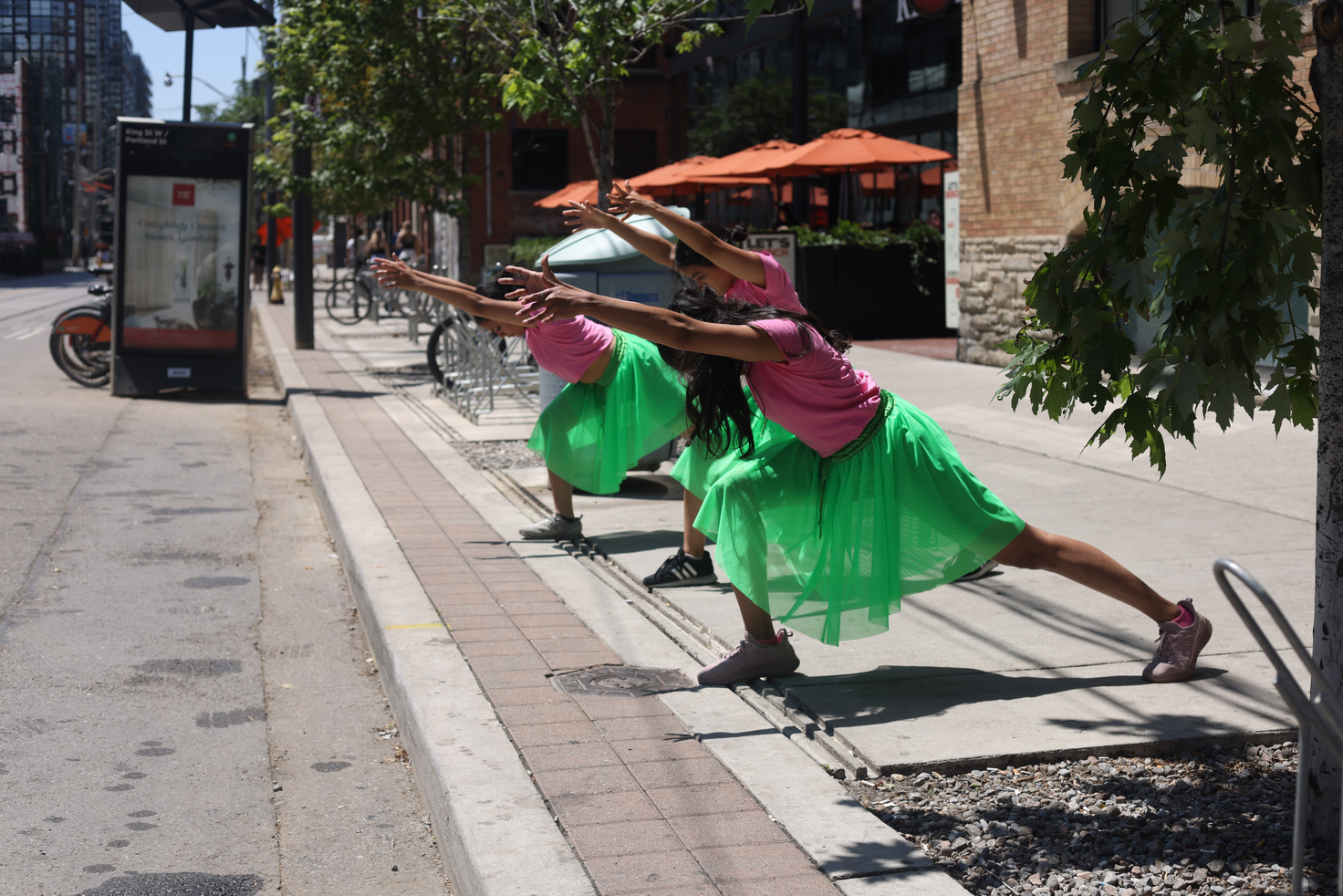 Momentarily transforming the popular destination at King and Portland into a site of critical engagement through a 29-step choreography that invited spatial negotiation and encounters with the Other within a space that is otherwise governed by capitalist-consumerist logic that actively seeks to erase all forms of anomaly.

This is created in response to Score 4. 

Score 4 is created by Mushtari Afroz
Choreography created by Mushtari Afroz
Performance co-created with Rachana Joshi, Rajvi Dedhia and Nidhi Baadkar.