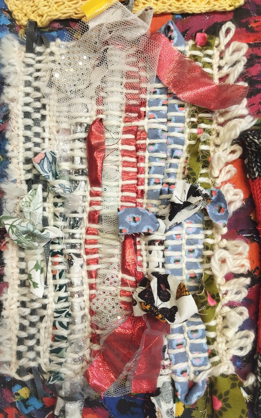 Weaving with white warp and fabric strips weft