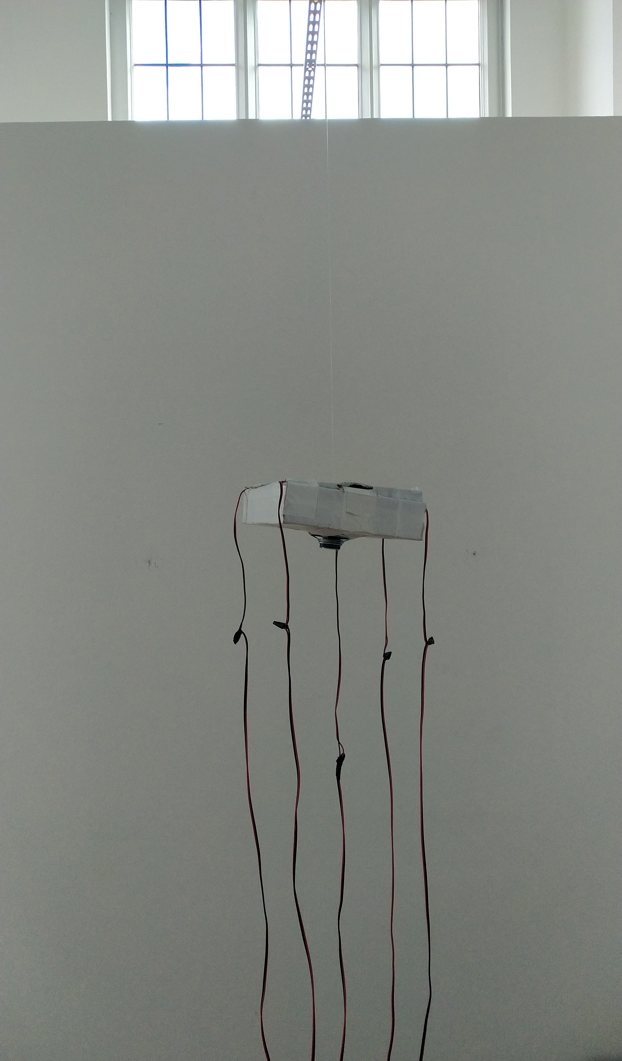 A close-up detail of part of the hanging apparatus from the Local Seis installation work.
