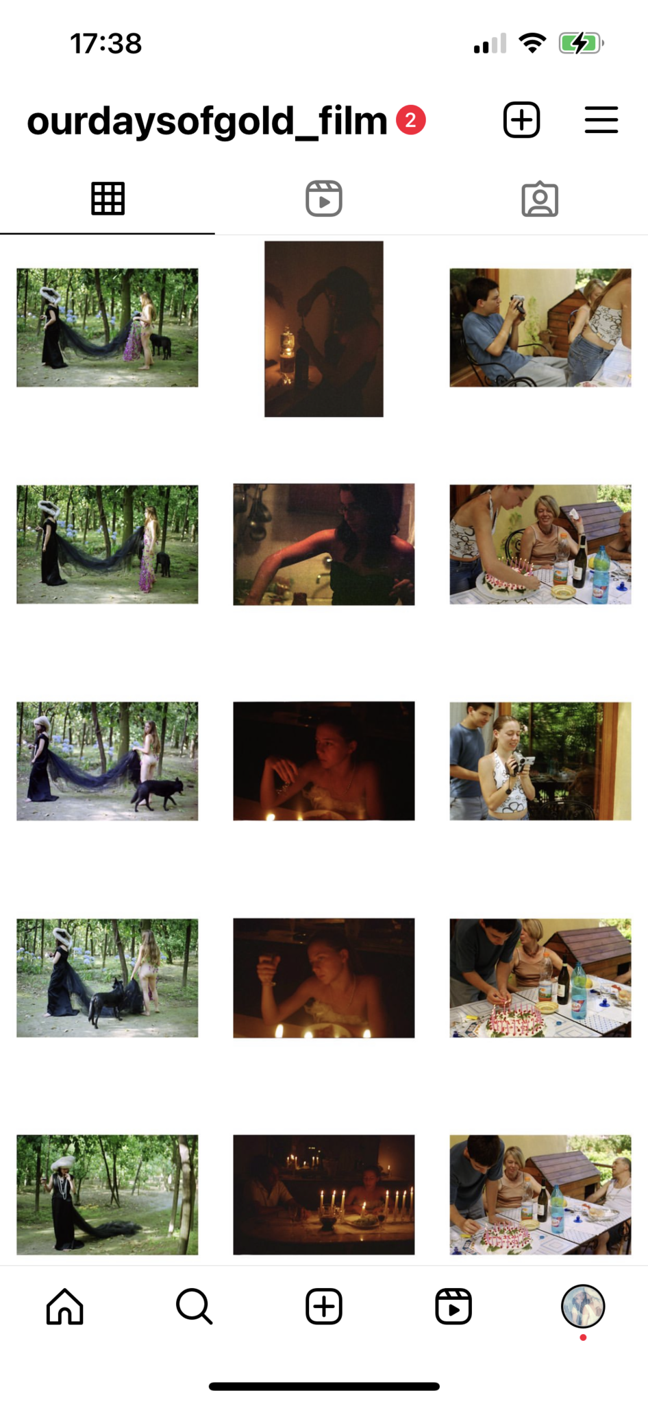 A screenshot of an Instagram profile page, showing a 3×5 grid of photo posts from @ourdaysofgold_film. The images include outdoor scenes with two women and a black dog, several dimly lit indoor scenes with people by candlelight, and a group of people around a table with food and a birthday cake.