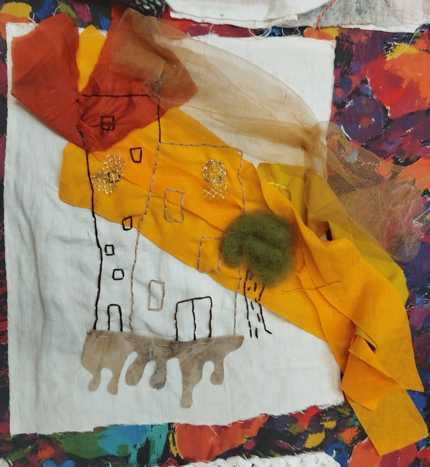 applique with building on fire