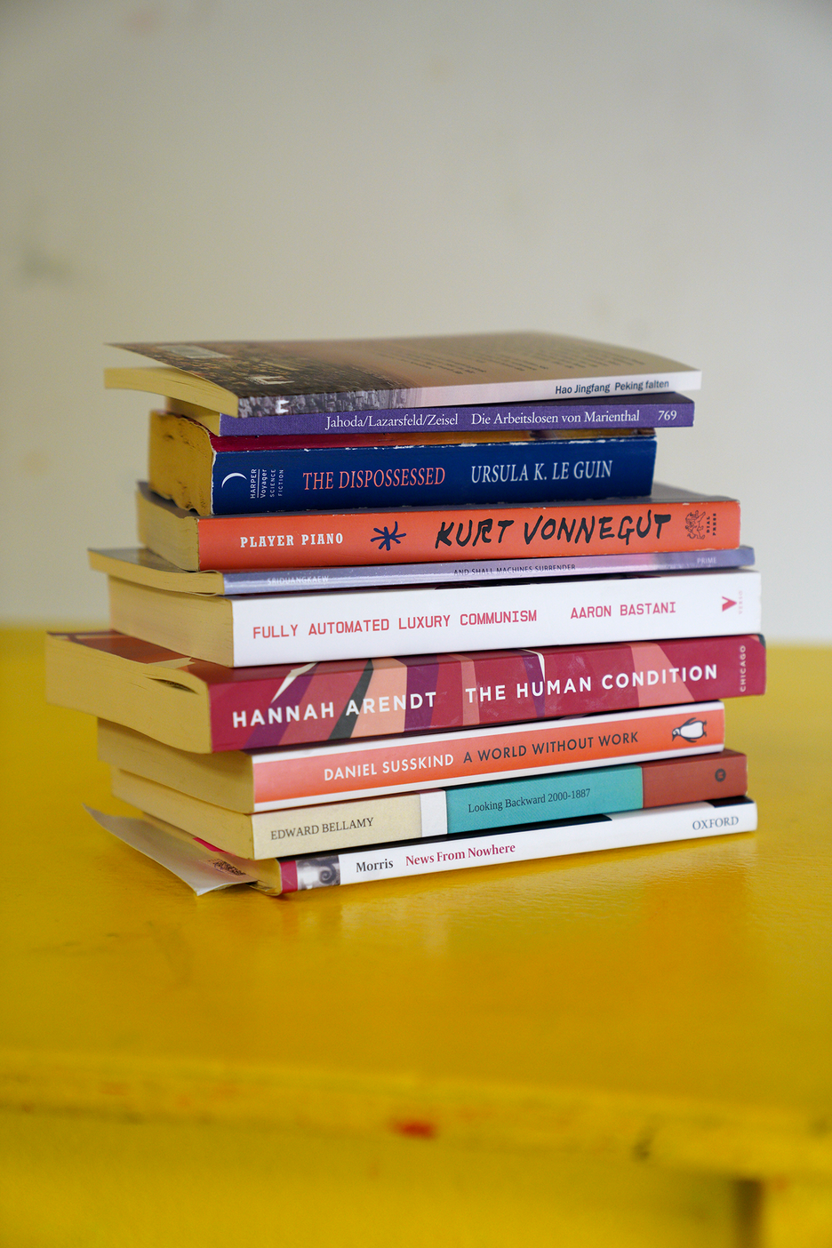 Stack of books with reference to post-work scenarios.