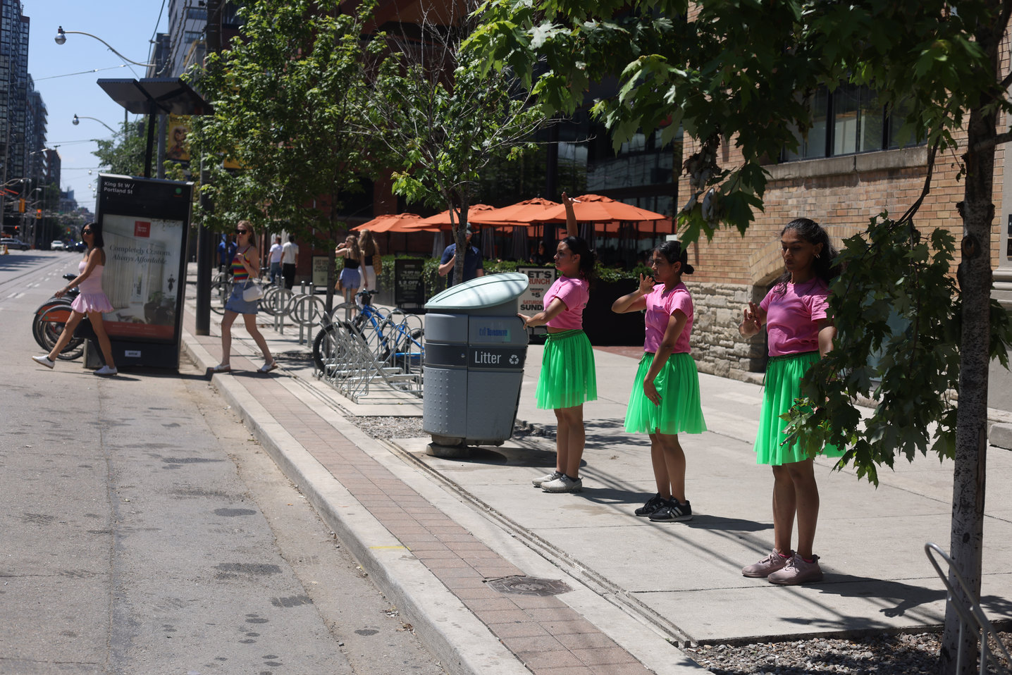 Momentarily transforming the popular destination at King and Portland into a site of critical engagement through a 29-step choreography that invited spatial negotiation and encounters with the Other within a space that is otherwise governed by capitalist-consumerist logic that actively seeks to erase all forms of anomaly.
This is created in response to Score 4. 
Score 4 is created by Mushtari Afroz
Choreography created by Mushtari Afroz
Performance co-created with Rachana Joshi, Rajvi Dedhia and Nidhi Baadkar.