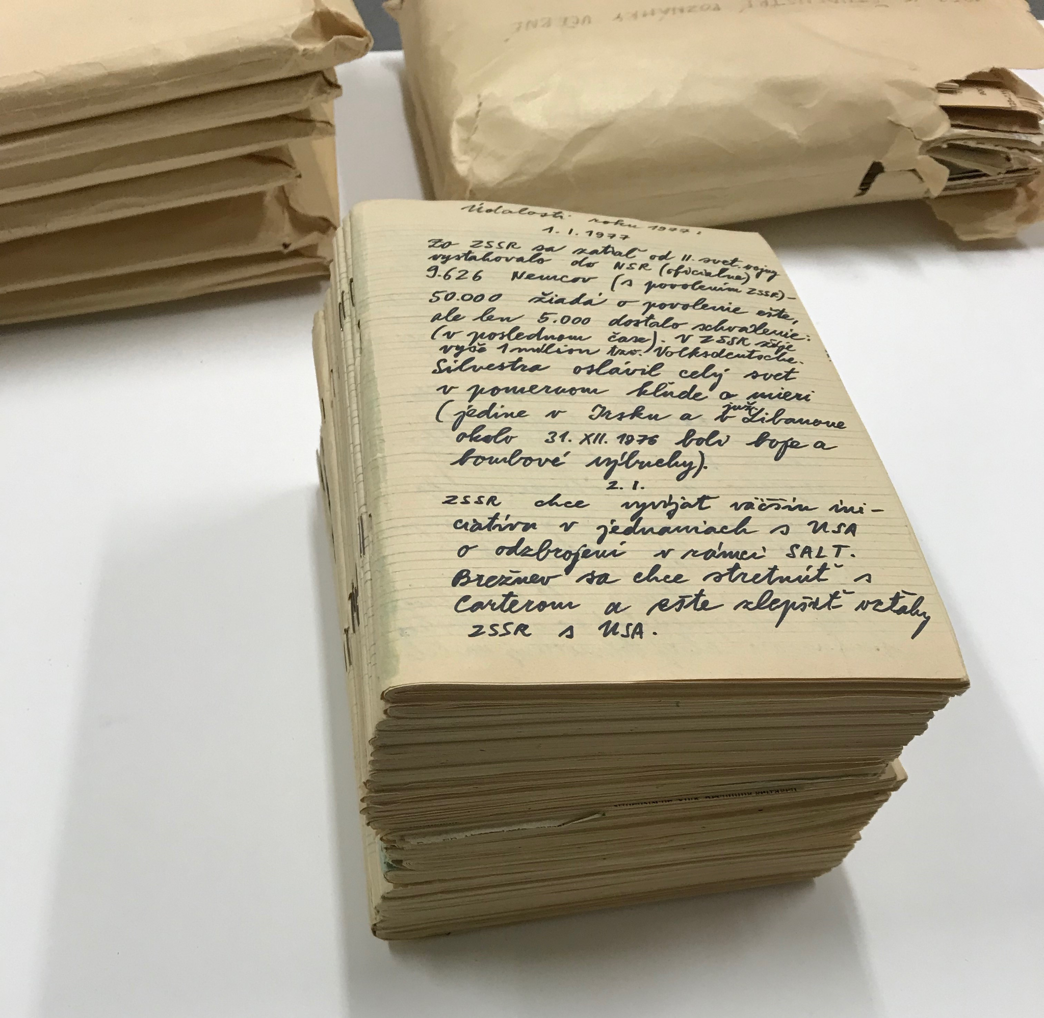 A pile of notebooks from Július Koller’s press notes from 1977.