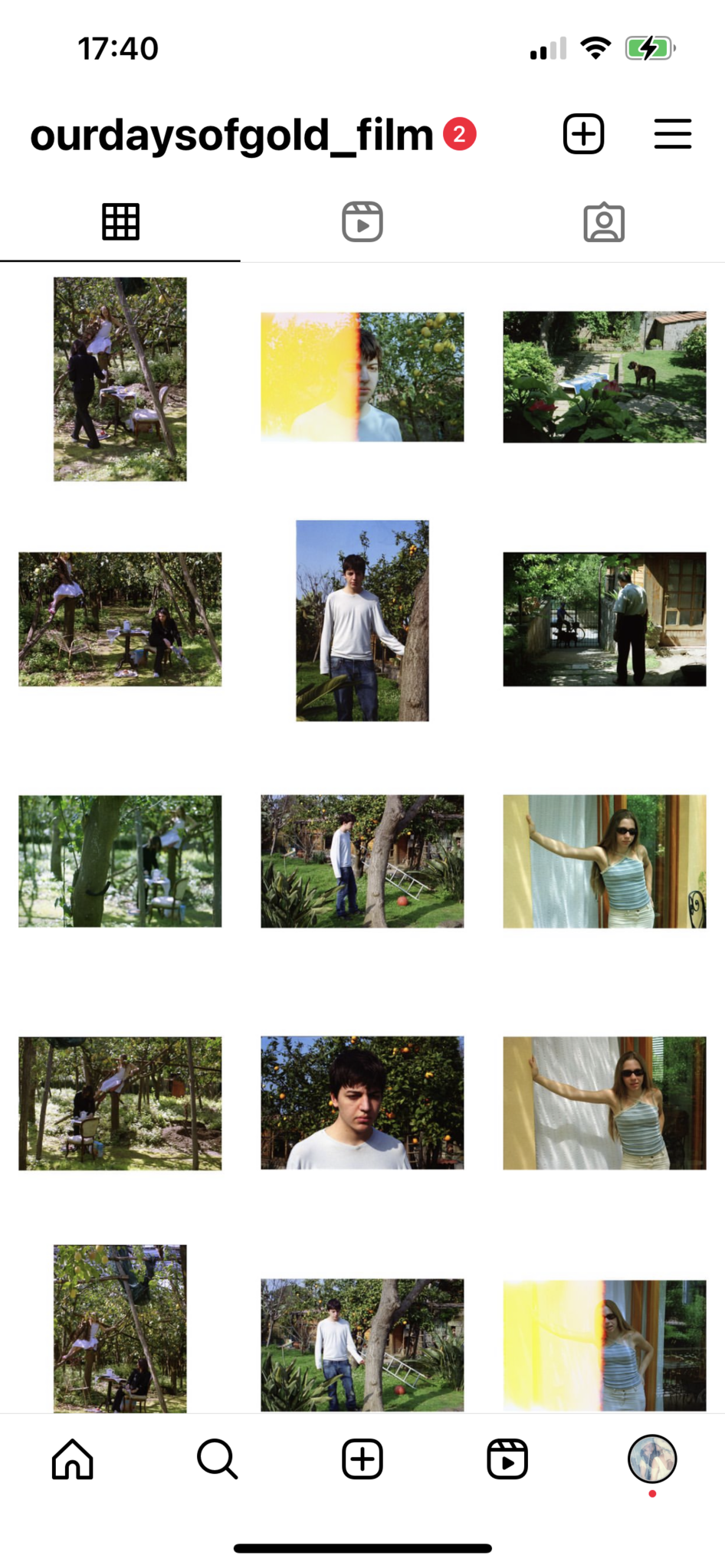 Screenshot of an Instagram profile grid from @ourdaysofgold_film showing fifteen photographs. The images include people outdoors in a garden or orchard, some sitting at a table, others standing by trees, and two portraits of individuals near a doorway. One image shows a person with a light flare across the frame.