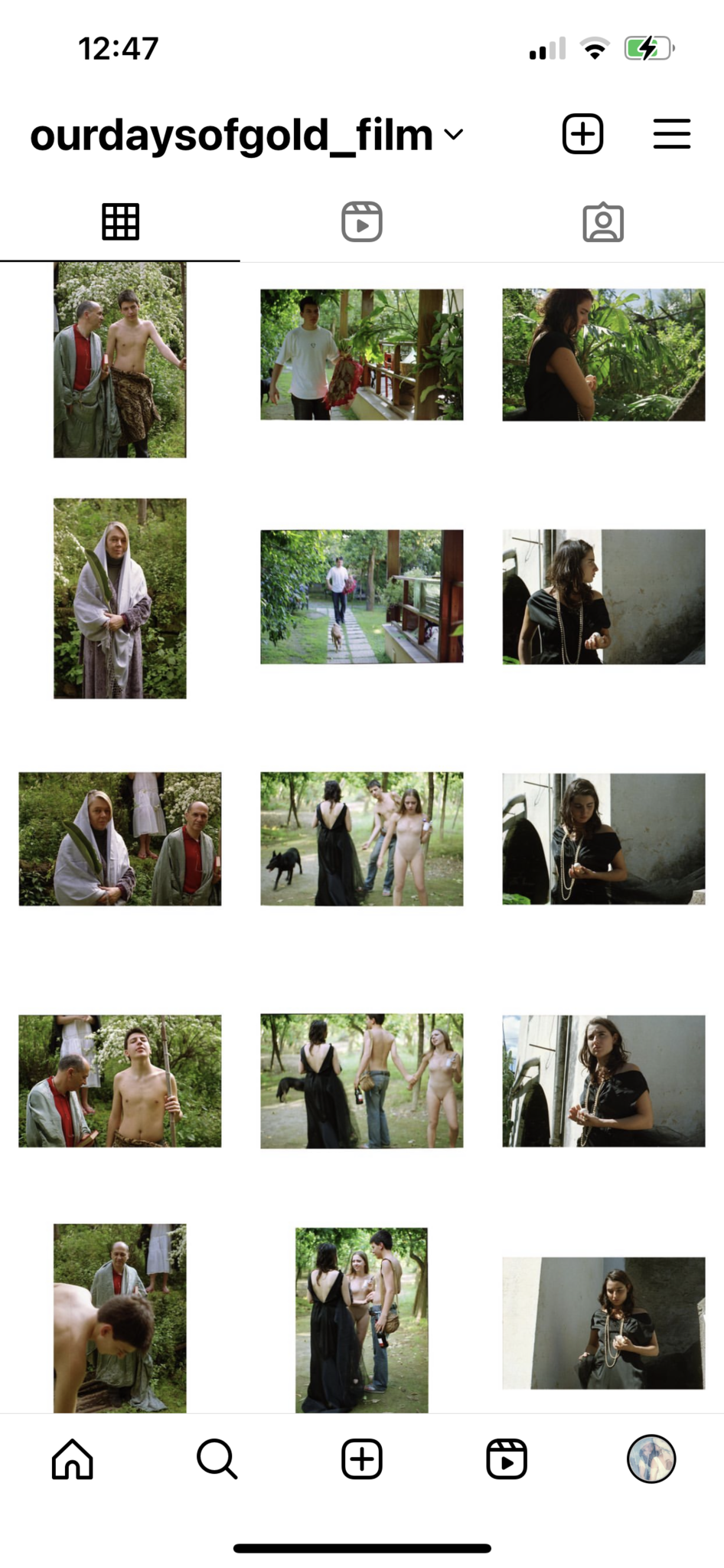 A grid of twelve photographs from the Instagram page @ourdaysofgold_film. The images depict people outdoors and near a house surrounded by greenery. Several figures are dressed in costumes, robes, or draped fabrics, while others are partially undressed. Some images show individuals walking on garden paths, holding objects, or interacting with each other. One black dog appears in two of the images. The settings include wooded areas, a veranda, and a shaded exterior wall.