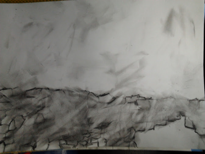 Partially erased black drawing of a dry stone wall on white paper.