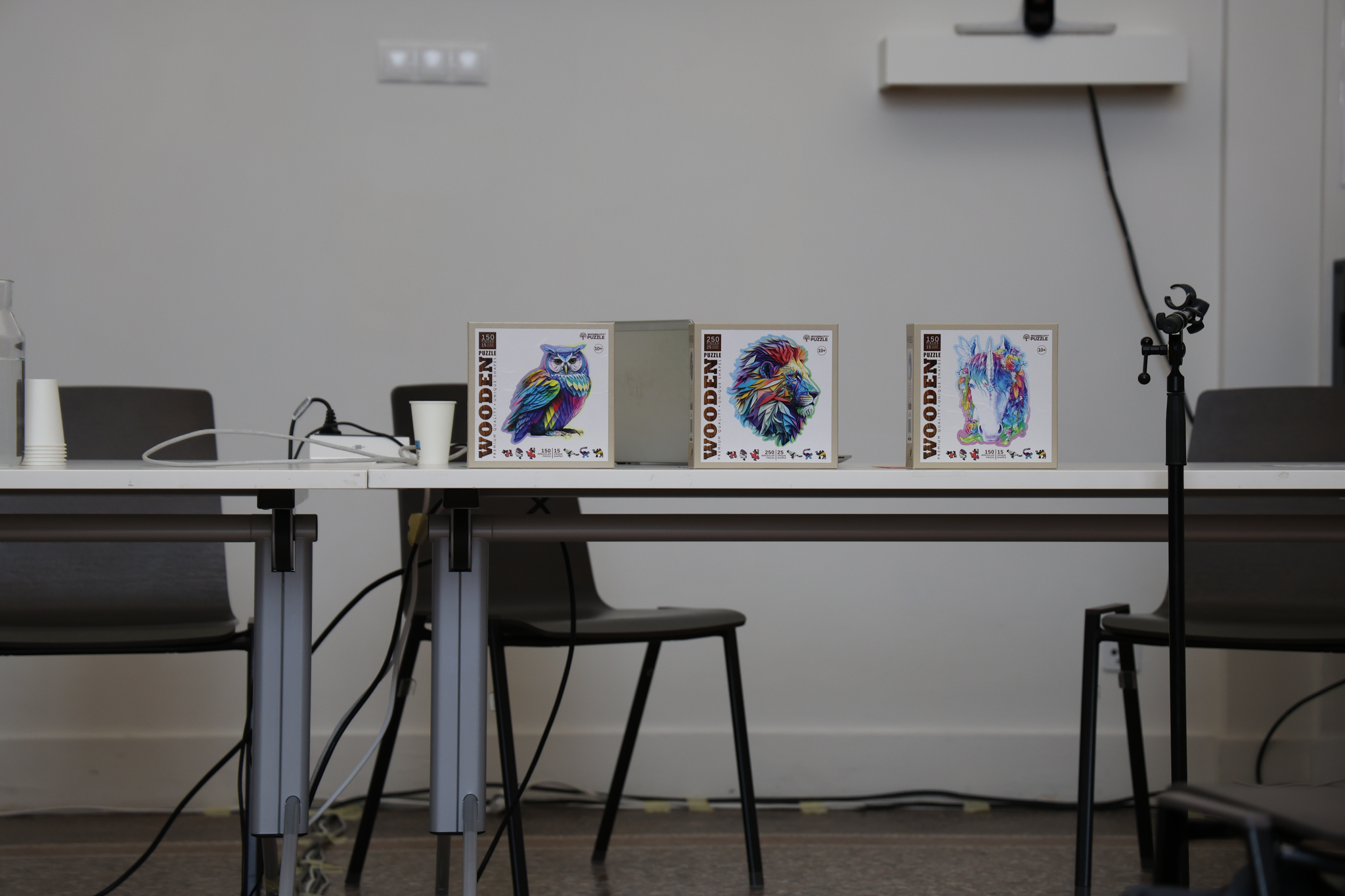 A picture of three puzzle boxes.